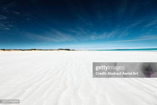 daytime shot looking up empty cable beach, broome, western australia, australia - cable beach stock-fotos und bilder