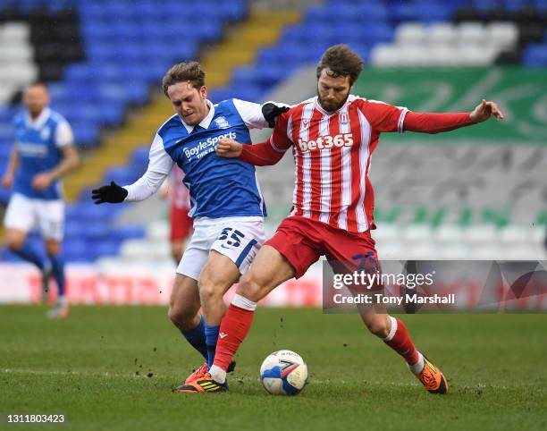 Alen Halilovic of Birmingham City challenges Nick Powell of Stoke City during the Sky Bet Championship match between Birmingham City and Stoke City...