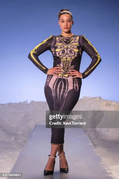 In this image released on April 10 A model walks the runway at the Dominnico fashion show during Mercedes Benz Fashion Week Madrid April 2021 on...