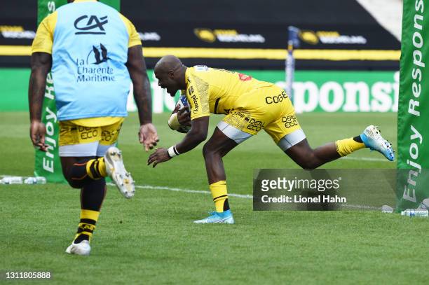 Raymond Rhule of La Rochelle runs through to score their third try during the Quarter Final Champions Cup match between La Rochelle and Sale Sharks...