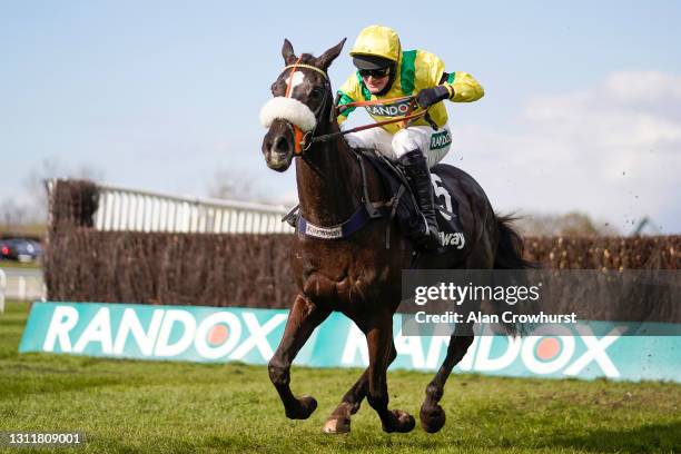 David Bass riding Happygolucky clear the last to win The Betway Handicap Chase at Aintree Racecourse on April 10, 2021 in Liverpool, England....