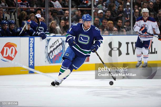 Cody Hodgson of the Vancouver Canucks skates against the Edmonton Oilers on October 25, 2011 at Rexall Place in Edmonton, Alberta, Canada.