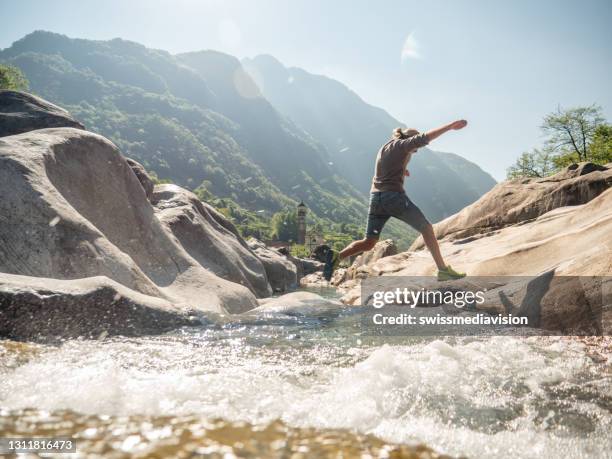 Stepping Over Rocks Stepping On Rocks Photos and Premium High Res Pictures - Getty Images