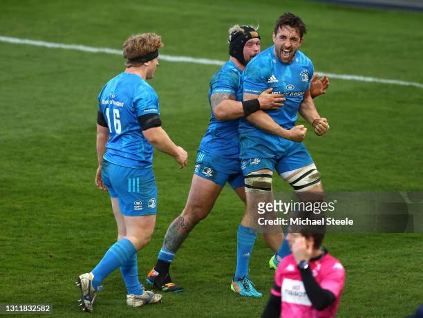 Jack Conan of Leinster celebrates with team mate Ed Byrne following the Heineken Champions Cup Quarter Final match between Exeter Chiefs and Leinster...