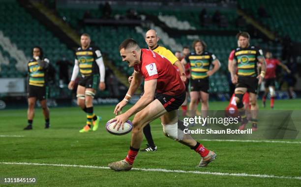 Jacob Stockdale scores their fifth try during the European Rugby Challenge Cup match between Northampton Saints and Ulster Rugby at Franklin's...