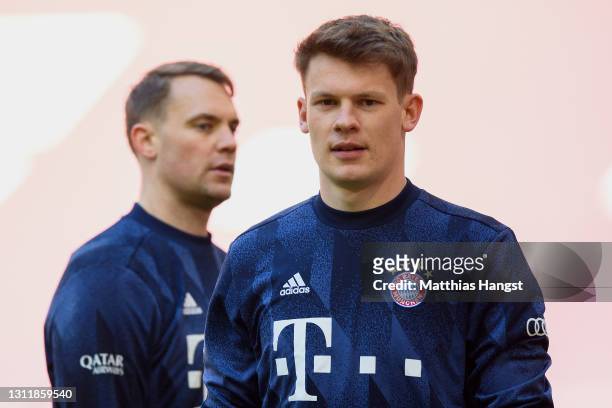 Goalkeeper Manuel Neuer of FC Bayern München and Goalkeeper Alexander Nübel of FC Bayern München seen ahaed of the Bundesliga match between FC Bayern...
