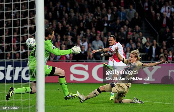 Gregory van der Wiel of Ajax scores the opening goal during the UEFA Champions League group D match between AFC Ajax and GNK Dinamo Zagreb at the...