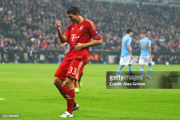 Mario Gomez of Muenchen celebrates his team's first goal during the UEFA Champions League group A match between FC Bayern Muenchen and SSC Napoli at...