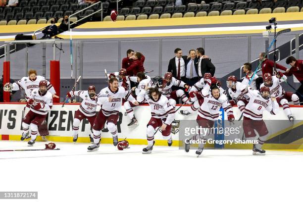 The Massachusetts Minutemen celebrates during after winning the Division I Men's Ice Hockey Championship 5-0 against the St. Cloud St. Huskies at PPG...