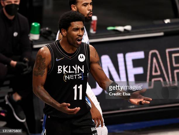 Kyrie Irving of the Brooklyn Nets reacts after he was given a double technical foul and ejected from the game in the third quarter against the Los...