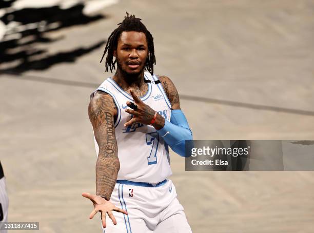 Ben McLemore of the Los Angeles Lakers celebrates his three point shot in the fourth quarter against the Brooklyn Nets at Barclays Center on April...