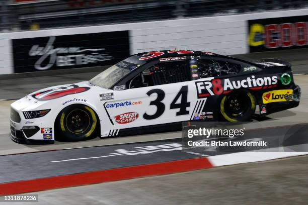 Michael McDowell, driver of the Fr8Auctions Ford, drives during the NASCAR Cup Series Blue-Emu Maximum Pain Relief 500 at Martinsville Speedway on...