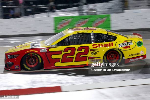 Joey Logano, driver of the Shell Pennzoil Ford, drives during the NASCAR Cup Series Blue-Emu Maximum Pain Relief 500 at Martinsville Speedway on...