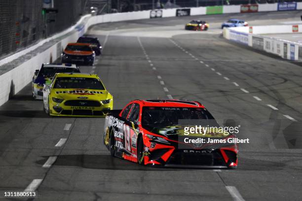 Martin Truex Jr., driver of the Bass Pro Toyota, drives during the NASCAR Cup Series Blue-Emu Maximum Pain Relief 500 at Martinsville Speedway on...