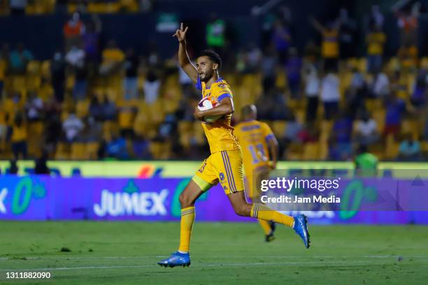 Diego Reyes of Tigres celebrates after scoring his team's first goal during the 14th round match between Tigres UANL and America as part of the...