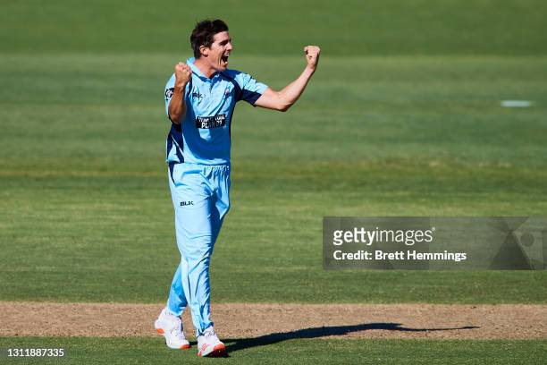 Sean Abbott of NSW celebrates after taking the wicket of Mitch Marsh of Western Australiaduring the 2021 Marsh One Day Cup Final match between New...