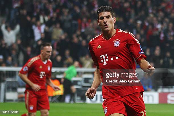 Mario Gomez of Muenchen celebrates his team's second goal during the UEFA Champions League group A match between FC Bayern Muenchen and SSC Napoli at...