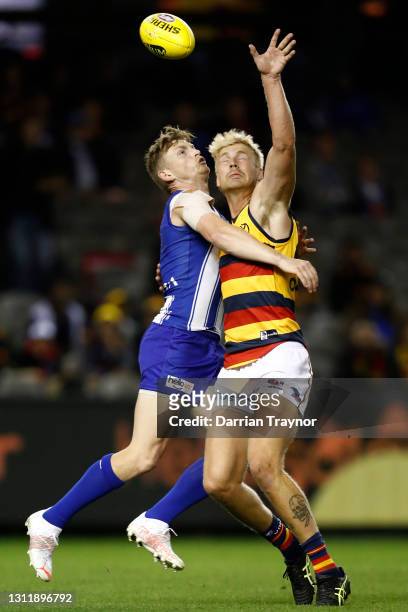Jack Ziebell of the Kangaroos and Billy Frampton of the Crows compete during the round four AFL match between the North Melbourne Kangaroos and the...