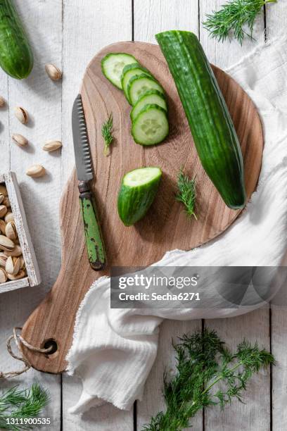 cucumber and pistachio spring salad - cucumber stock pictures, royalty-free photos & images