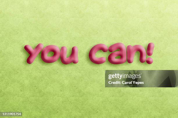 you can text made of plasticine in green background - encouragement letter stock pictures, royalty-free photos & images