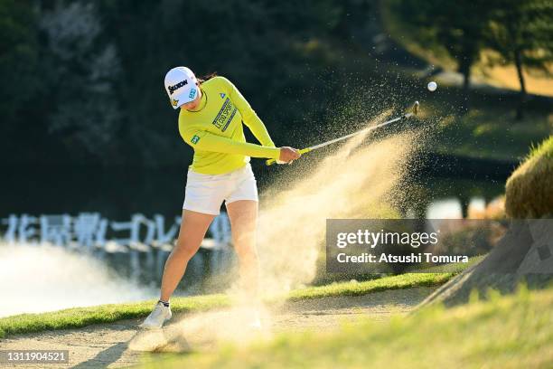 Sakura Koiwai of Japan hits out from a bunker on the play off second hole on the 18th hole during the final round of the Fujiflim Studio Alice Ladies...