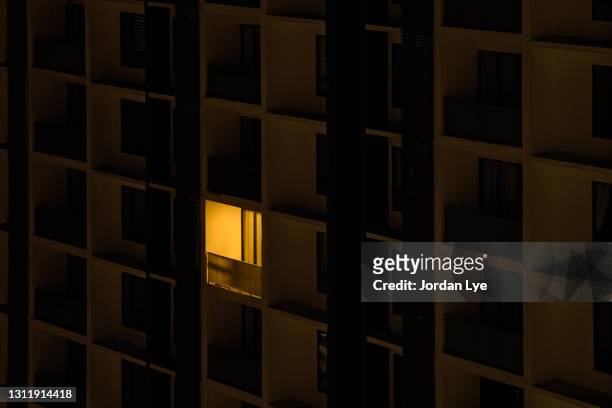 conceptual of an idea among the rest - night light stock pictures, royalty-free photos & images