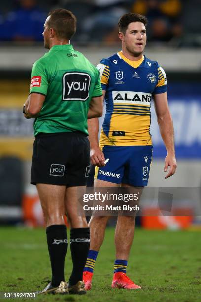 Mitchell Moses of the Eels watches the replay as he prepares for a kick at goal during the round five NRL match between the Parramatta Eels and the...