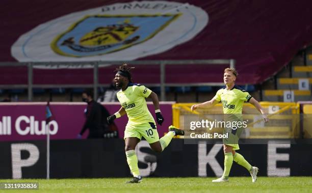 Allan Saint-Maximin of Newcastle United celebrates after scoring their team's second goal during the Premier League match between Burnley and...