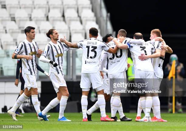 Dejan Kulusevski of Juventus celebrates with Danilo, Rodrigo Bentancur and Giorgio Chiellini after scoring their side's first goal during the Serie A...