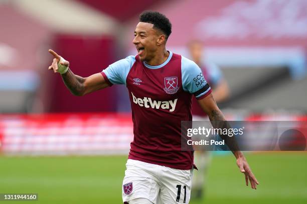 Jesse Lingard of West Ham United celebrates after scoring their team's first goal during the Premier League match between West Ham United and...