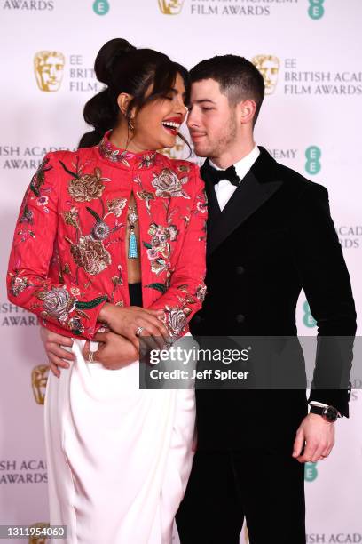 Awards Presenter Priyanka Chopra Jonas with her husband Nick Jonas attend the EE British Academy Film Awards 2021 at the Royal Albert Hall on April...