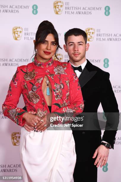 Awards Presenter Priyanka Chopra Jonas with her husband Nick Jonas attend the EE British Academy Film Awards 2021 at the Royal Albert Hall on April...