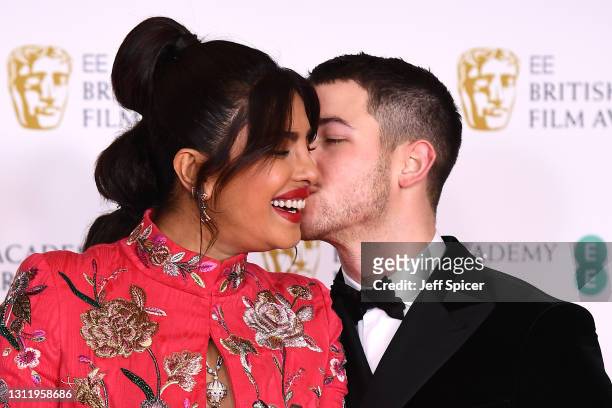 Awards Presenter Priyanka Chopra Jonas with her husband Nick Jonas attend the EE British Academy Film Awards 2021 at the Royal Albert Hall on April...