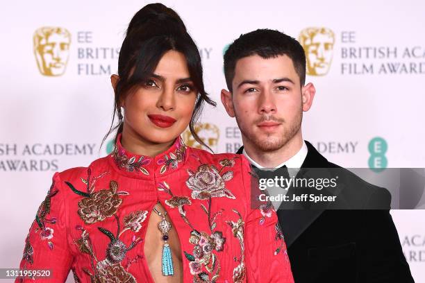 Awards Presenter Priyanka Chopra Jonas with her husband Nick Jonas attend the EE British Academy Film Awards 2021 at the Royal Albert Hall on April...