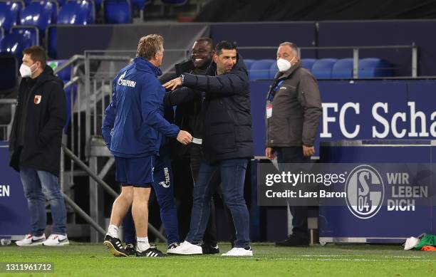 Dimitrios Grammozis, Head Coach of FC Schalke 04 celebrates victory during the Bundesliga match between FC Schalke 04 and FC Augsburg at...