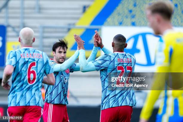Nicolas Tagliafico of Ajax and Sebastien Haller of Ajax celebrate their sides first goal during the Eredivisie match between RKC Waalwijk and Ajax at...