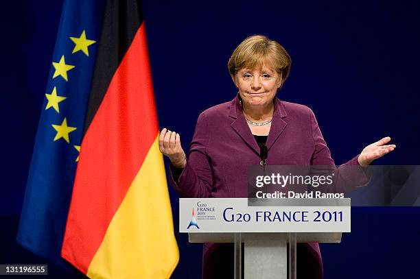 German Chancellor Angela Merkel reacts as she attends a press conference after a meeting with Greek Prime Minister George Papandreou, the French...