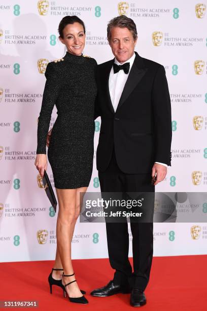Awards Presenter Hugh Grant and wife Anna Elisabet Eberstein attends the EE British Academy Film Awards 2021 at the Royal Albert Hall on April 11,...