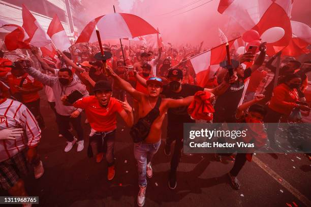 Fans of Toluca cheer during the 14th round match between Toluca and Monterrey as part of the Torneo Guard1anes 2021 Liga MX at Nemesio Diez Stadium...