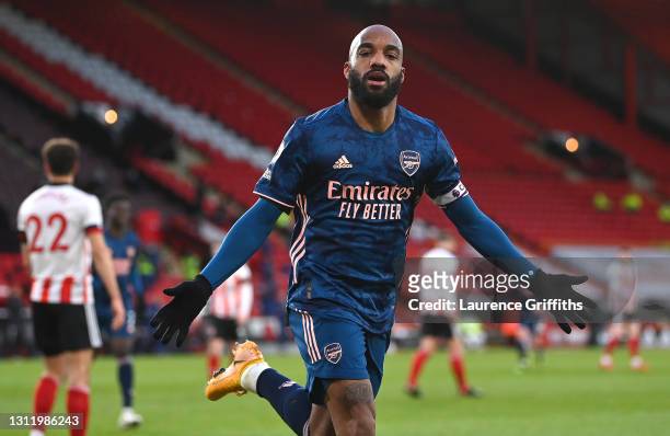 Alexandre Lacazette of Arsenal celebrates after scoring their side's first goal during the Premier League match between Sheffield United and Arsenal...