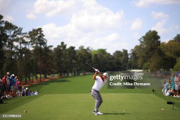 Xander Schauffele of the United States plays his shot from the first tee during the final round of the Masters at Augusta National Golf Club on April...