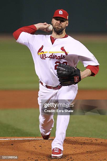 Chris Carpenter of the St. Louis Cardinals pitches during Game Seven of the MLB World Series against the Texas Rangers at Busch Stadium on October...