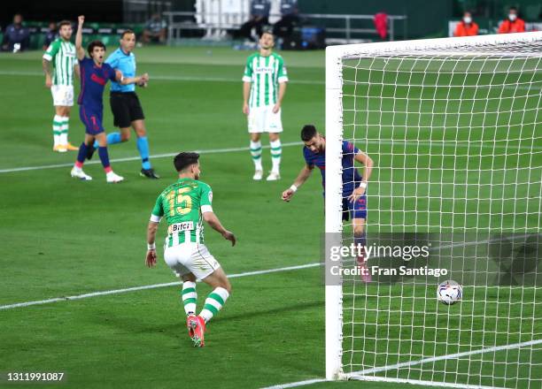 Yannick Carrasco of Atletico de Madrid scores their side's first goal during the La Liga Santander match between Real Betis and Atletico de Madrid at...