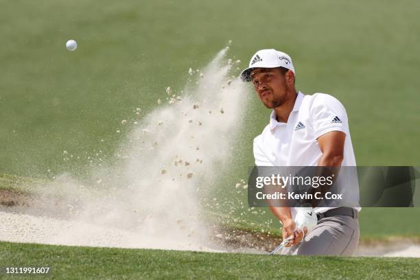 Xander Schauffele of the United States plays a shot from a bunker on the second hole during the final round of the Masters at Augusta National Golf...