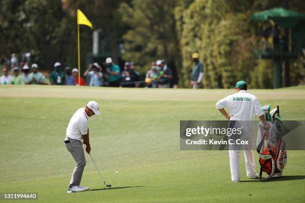 Xander Schauffele of the United States plays a shot on the third hole during the final round of the Masters at Augusta National Golf Club on April...