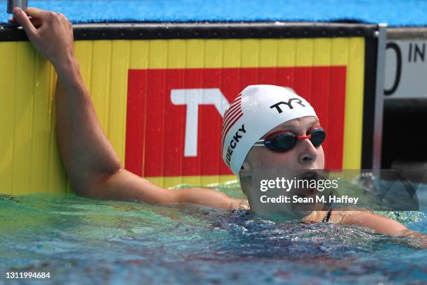 Katie Ledecky looks on after finishing second place in the Women's 100 Meter Freestyle Final on Day Four of the TYR Pro Swim Series at Mission Viejo...