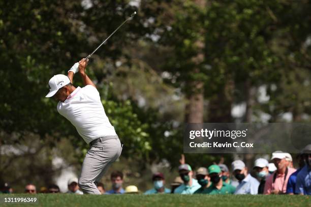 Xander Schauffele of the United States plays his shot from the fourth tee during the final round of the Masters at Augusta National Golf Club on...