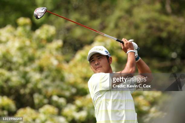 Hideki Matsuyama of Japan plays his shot from the fifth tee during the final round of the Masters at Augusta National Golf Club on April 11, 2021 in...