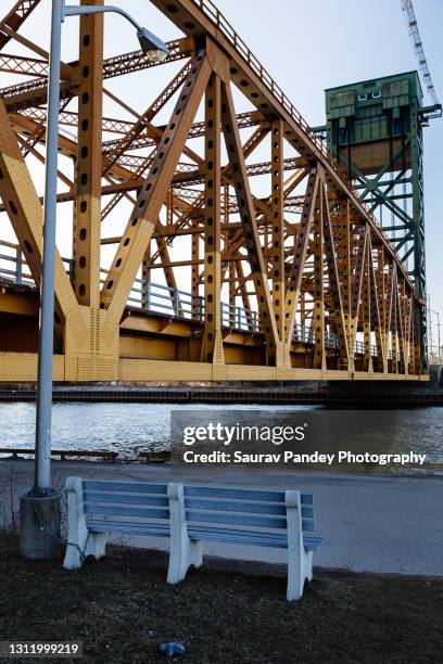 bench, bridge and canal - hamilton ontario stock pictures, royalty-free photos & images