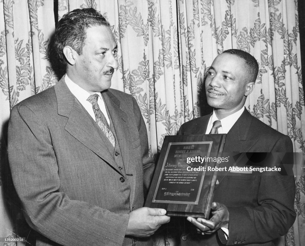 Marshall Accepts Award
